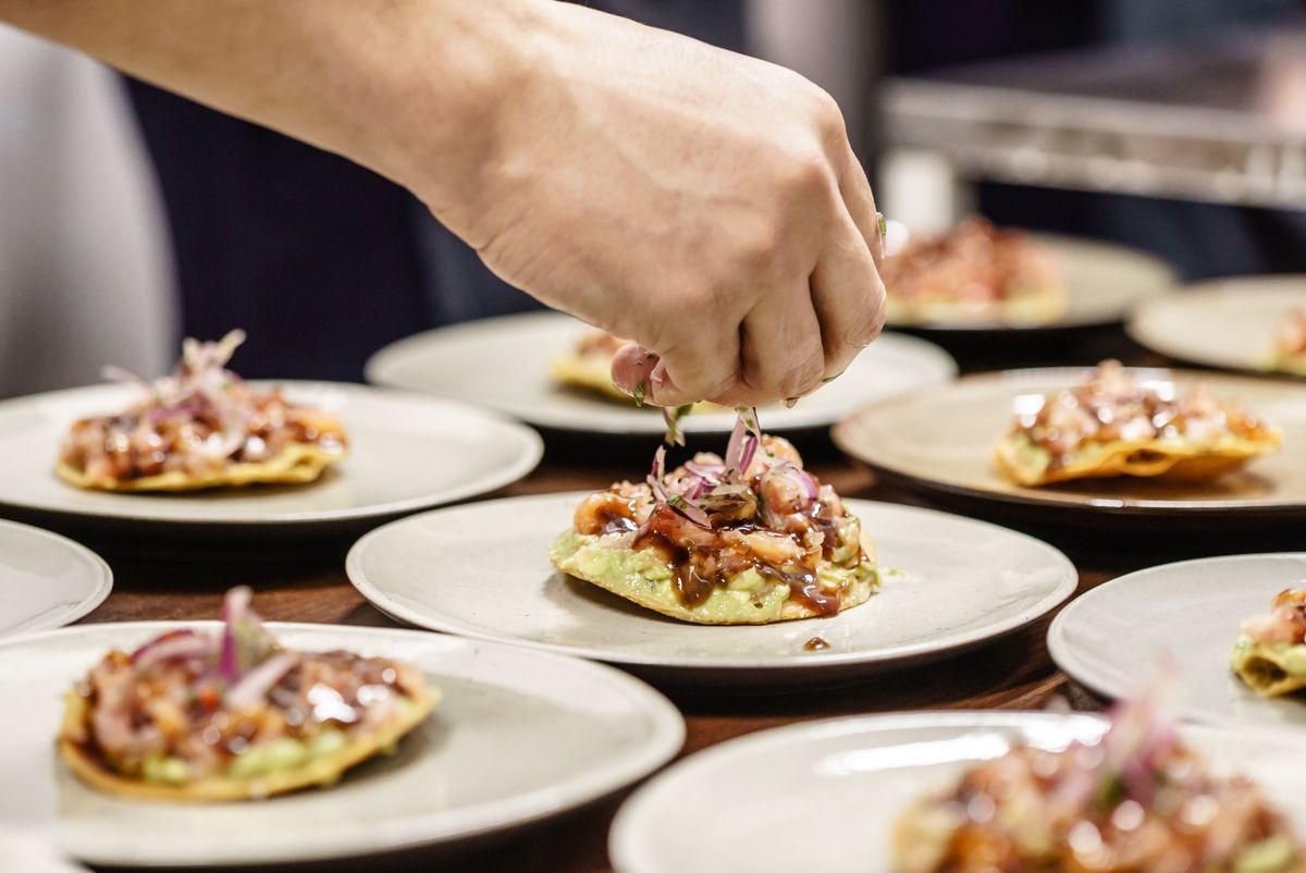 Mexican catering spread laid out at a restaurant